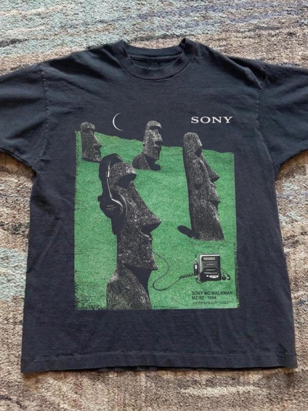 Gildan Black Tee with Green Moai Graphic and Sony Logo